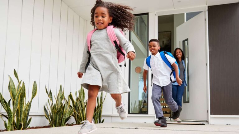 two children leaving for school 1