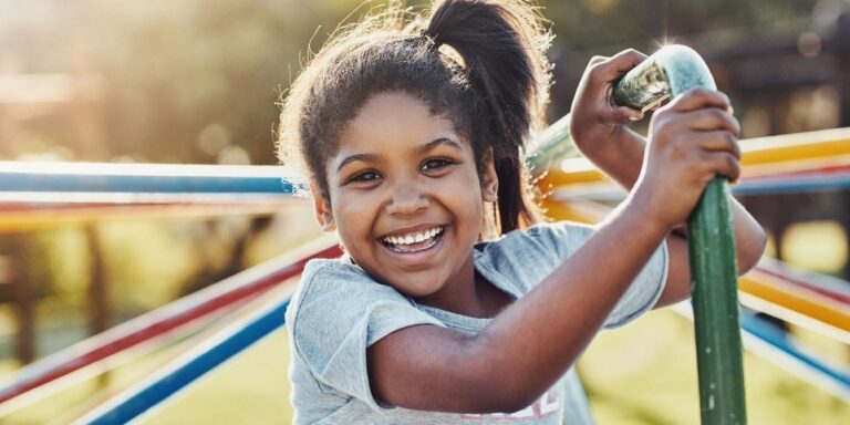 girl playing on playground