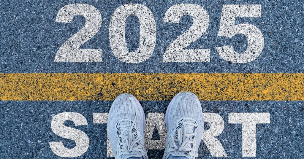 Runner starting line race 2025 new year planning success habits GettyImages 2082917876 Dilok Klaisataporn cropped